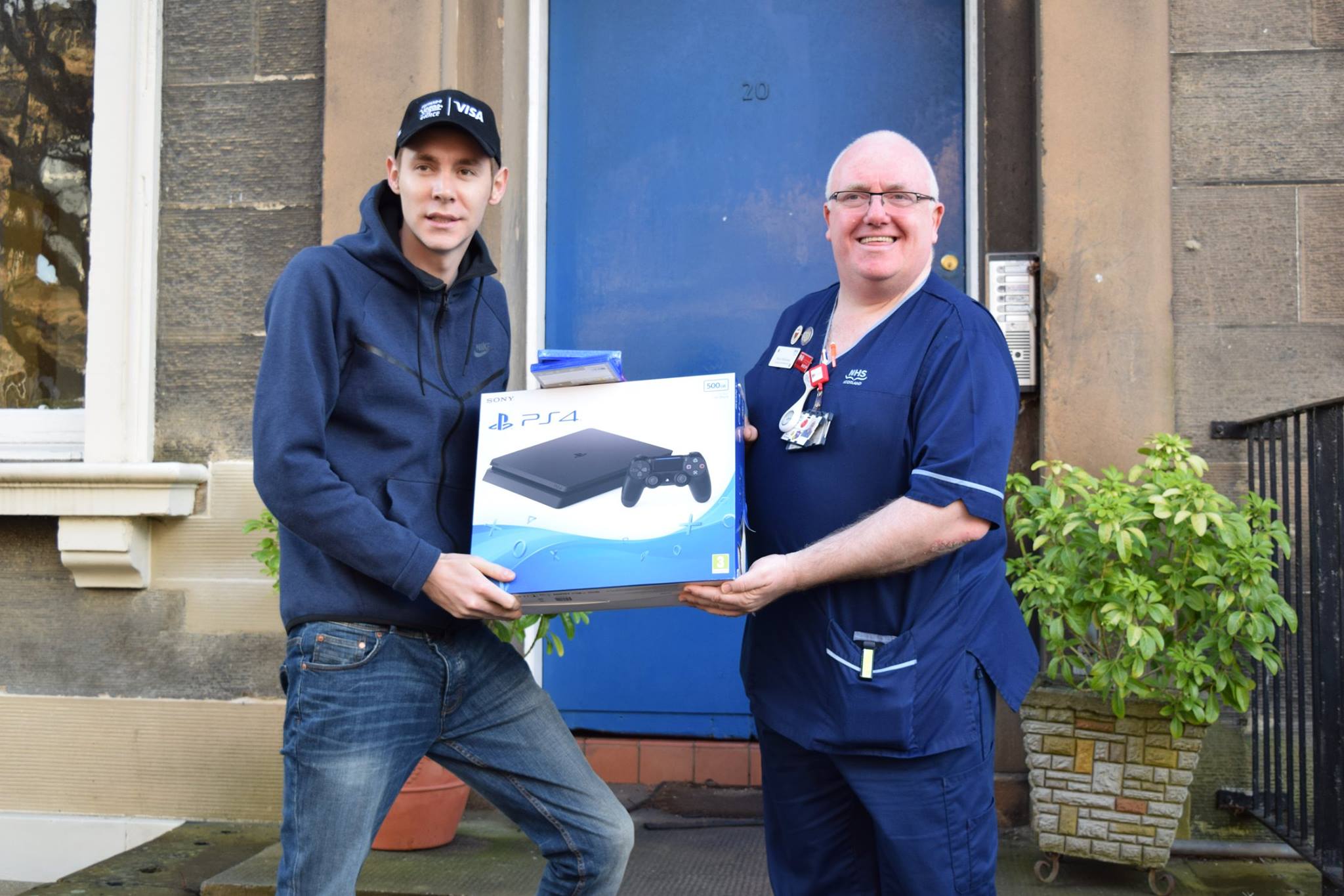 Graham Carroll donating gifts to edinburgh sick kids chairty